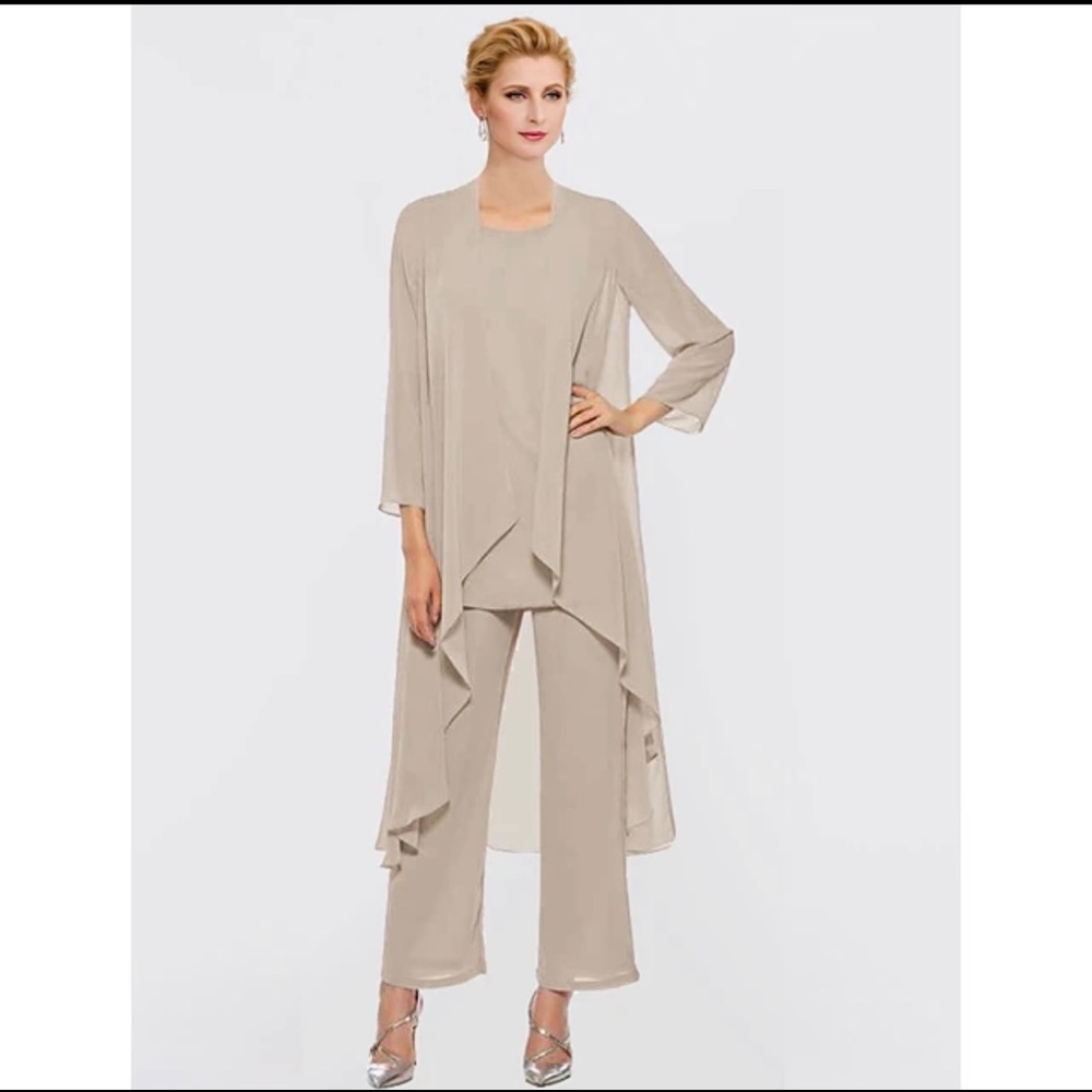 Mother of the Bride pantsuit. New with tags. Never worn. Pale green “celadon”.